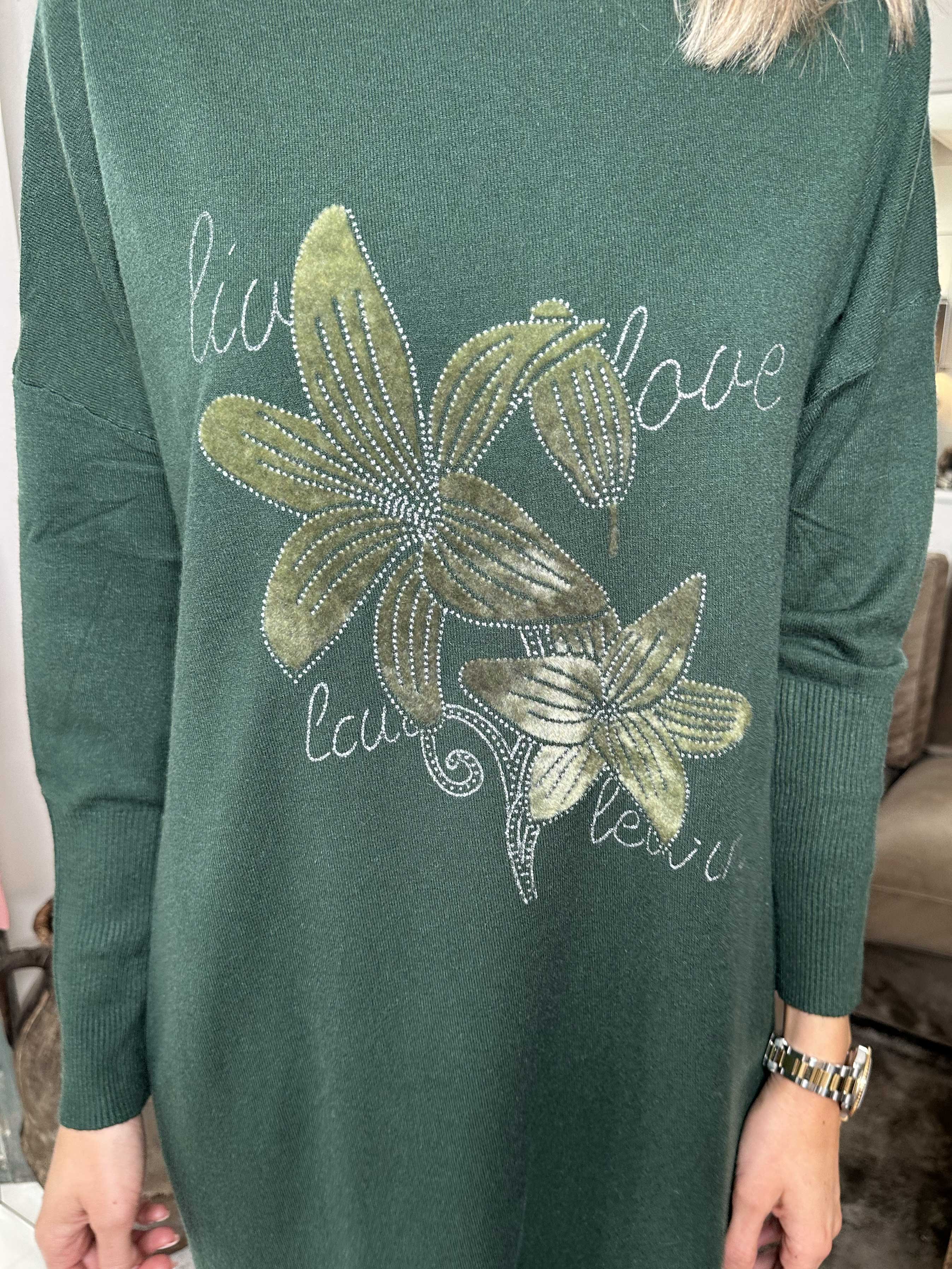 Amilie - Blød strikkjole med blomstermotiver